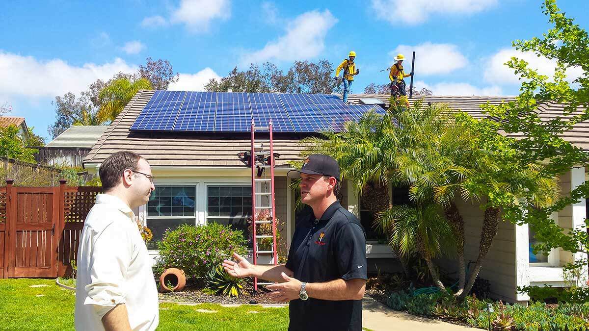 Daniel Sullivan educating homeowner about residential solar power
