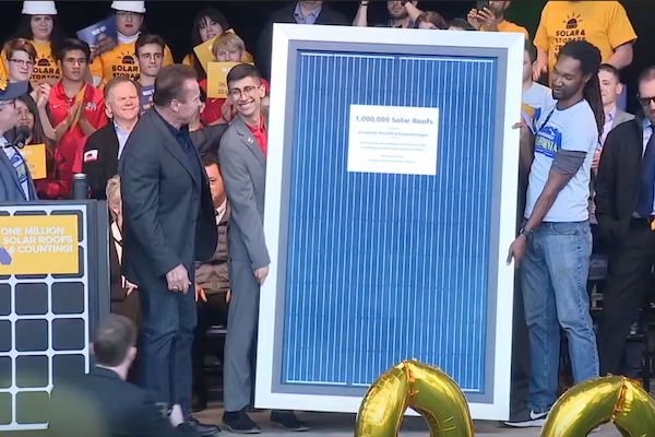 Former Governor Arnold Schwarzenegger Receiving Plaque for 1 Million Solar Roofs in California