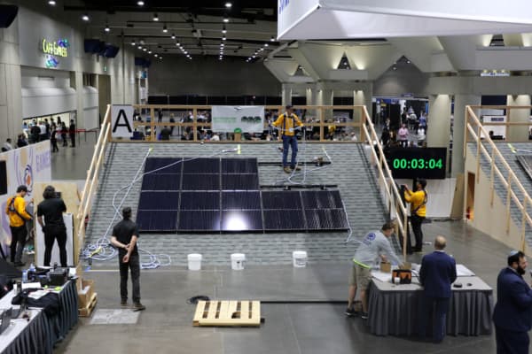 Photo of solar power installation during competition at indoor convention center