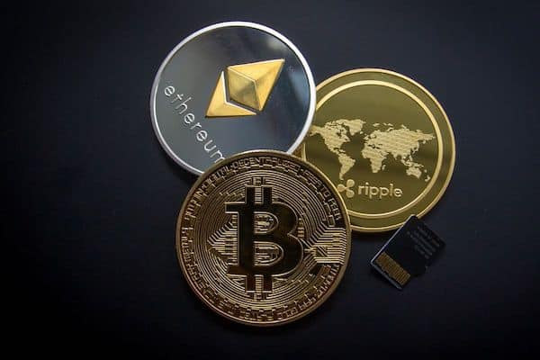 Image of coins representing bitcoin, ethereum, and ripple
