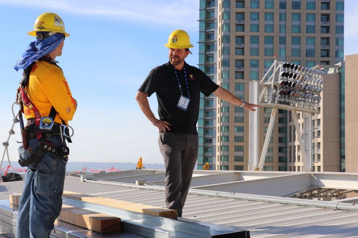 Image of Daniel Sullivan on the roof managing the commercial solar installation at Petco Park