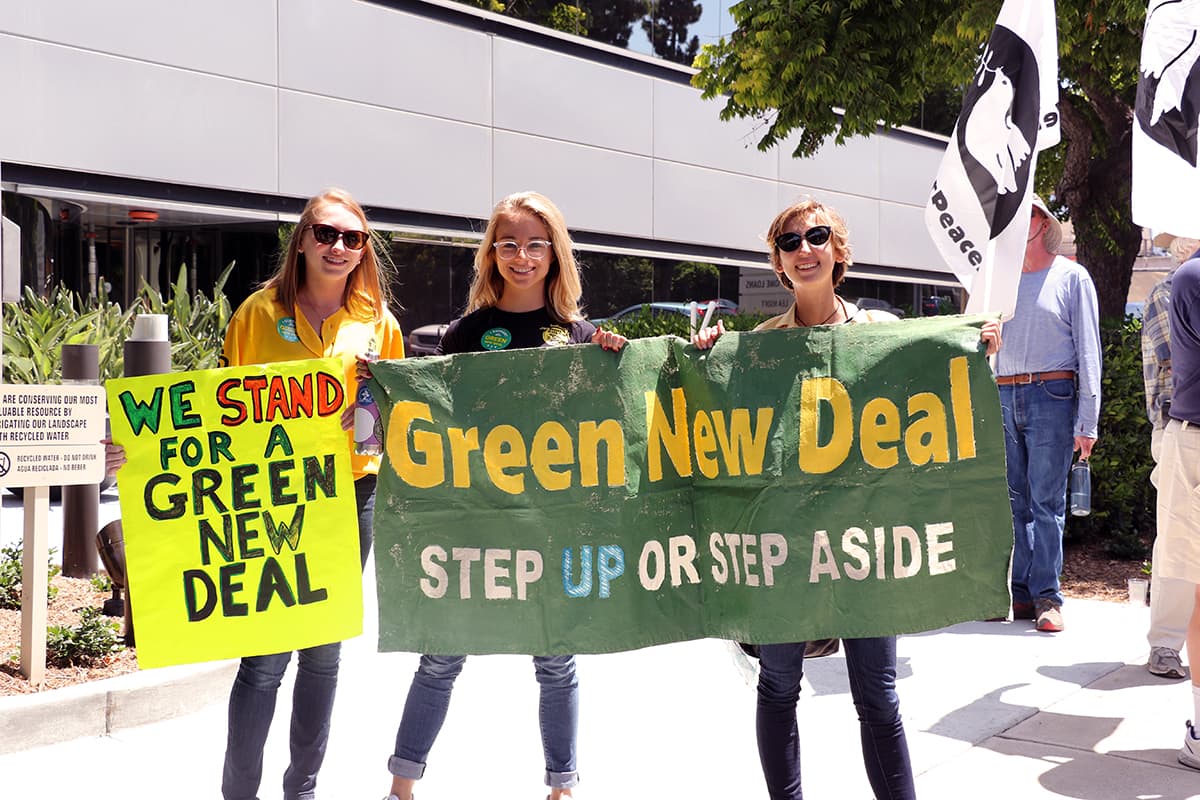 Photo of Green New Deal signs