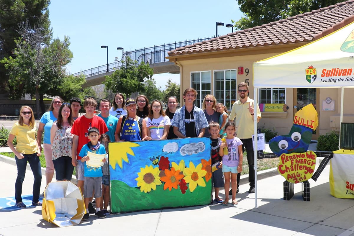 Santee students, Momentum Tutoring and Sullivan Solar Power employees smiling for photo