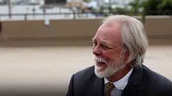 Screenshot of government commercial video testimonial